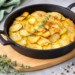 Pommes Anna aus festkochenden Kartoffeln und Butte